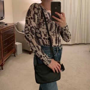 Black crossbody purse with tassel